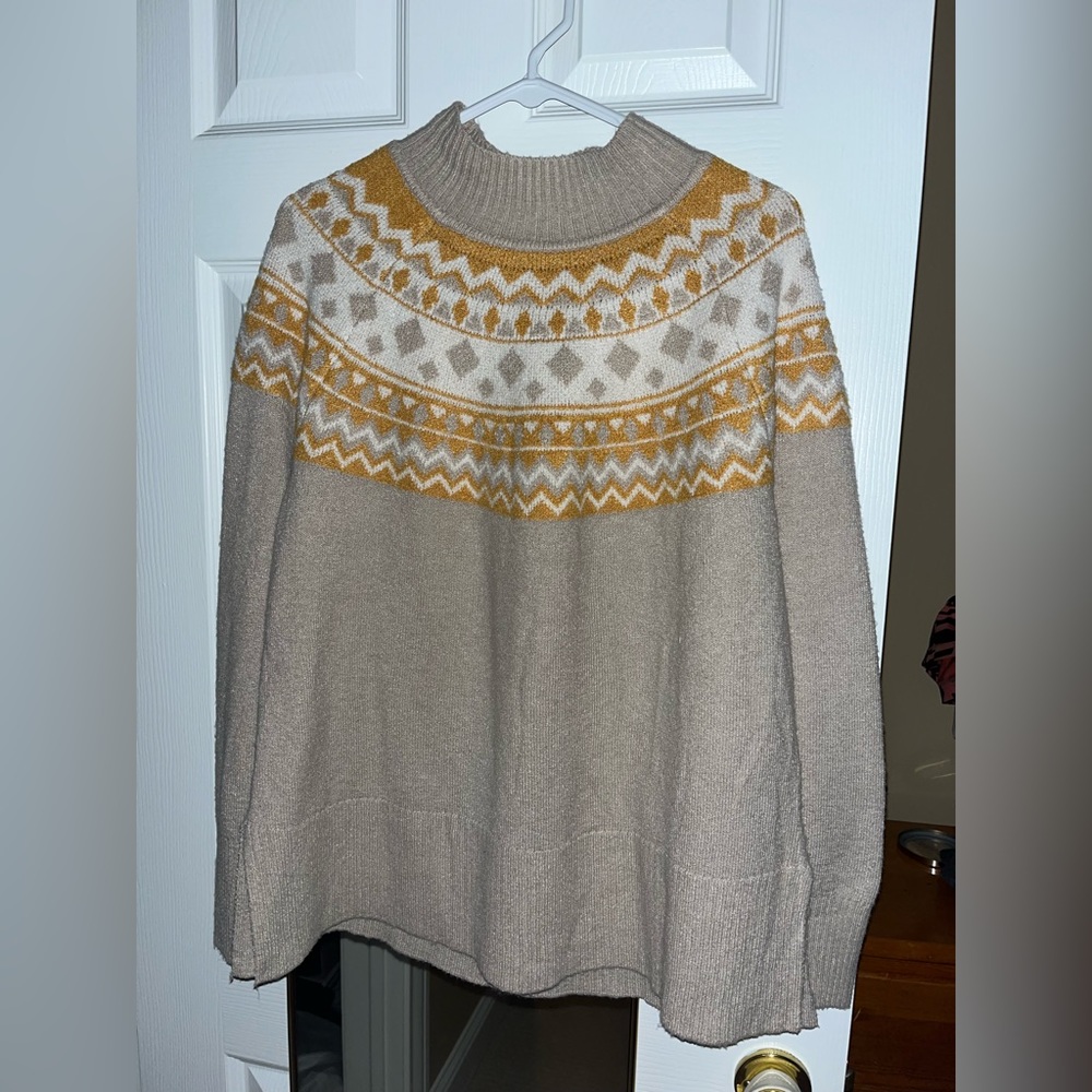 Cream and orange turtleneck sweater